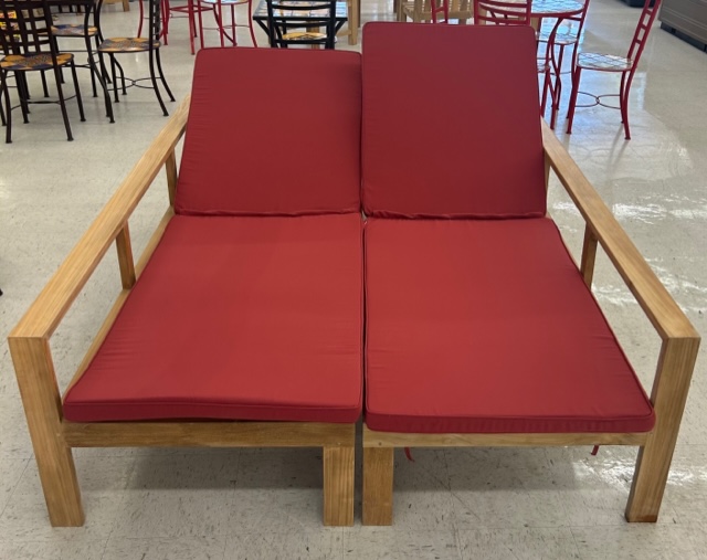 patio furniture in a showroom - 2 patio loungers