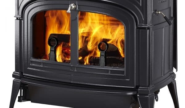 Close-up of a wood-burning fireplace focusing on the burning wood