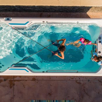 Family exercising in a SwimCross X500 Swim Spa