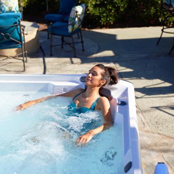 A woman relaxing in a hot tub